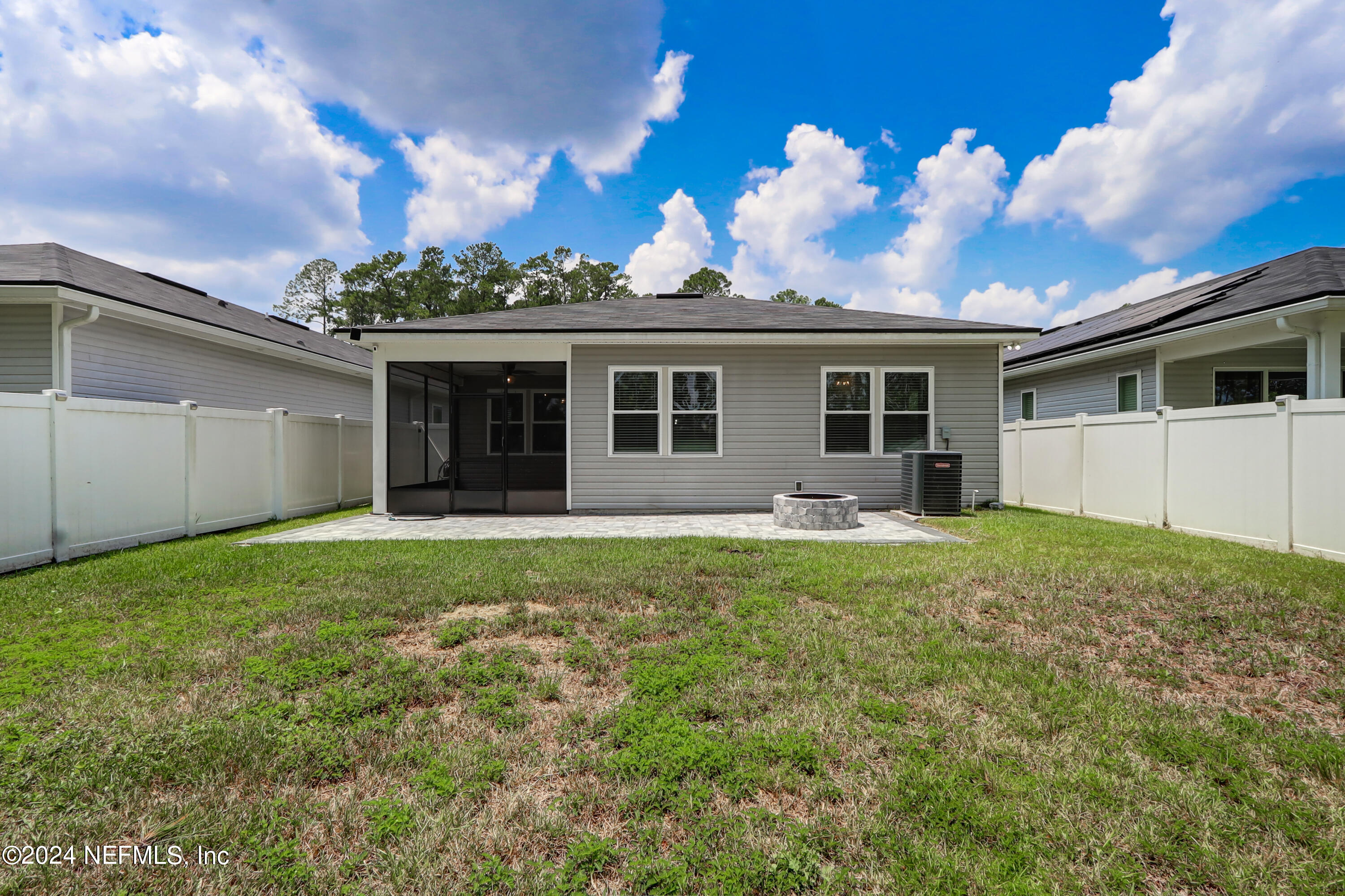 1880 Cogdill Trace Middleburg, FL 32068 - Photo 40 of 40 a view of a house with backyard and garden
