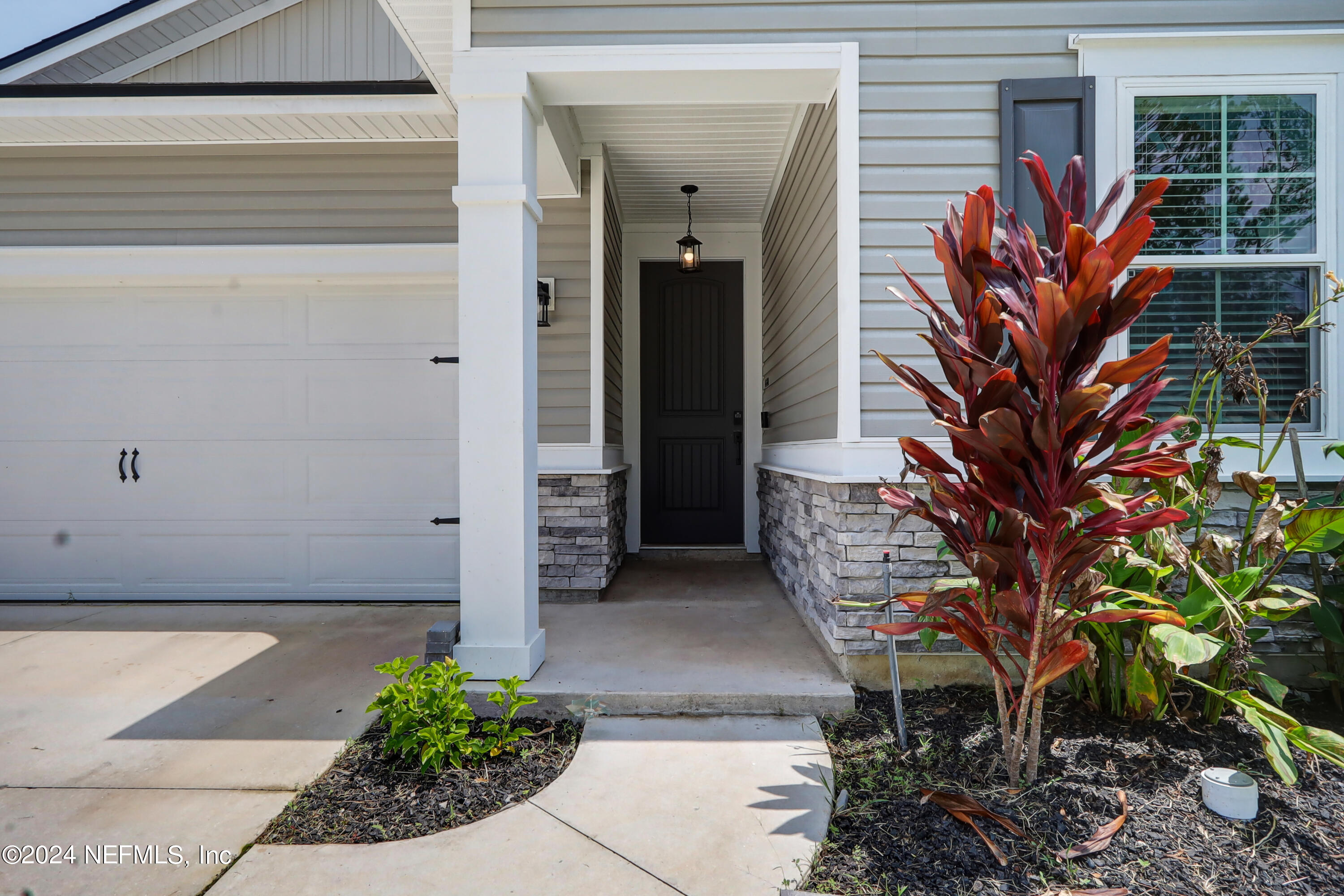 1880 Cogdill Trace Middleburg, FL 32068 - Photo 4 of 40 a view of a house with a backyard