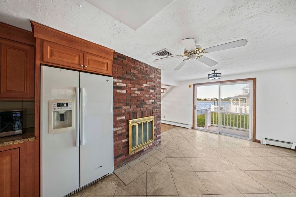 212 Nantasket Road Hull, MA 02045 - Photo 14 of 36 a spacious bathroom with a mirror a bathtub and a shower