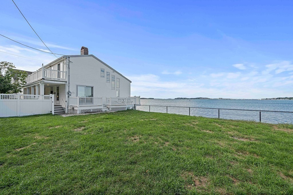 212 Nantasket Road Hull, MA 02045 - Photo 26 of 36 a view of a backyard with plants and large trees