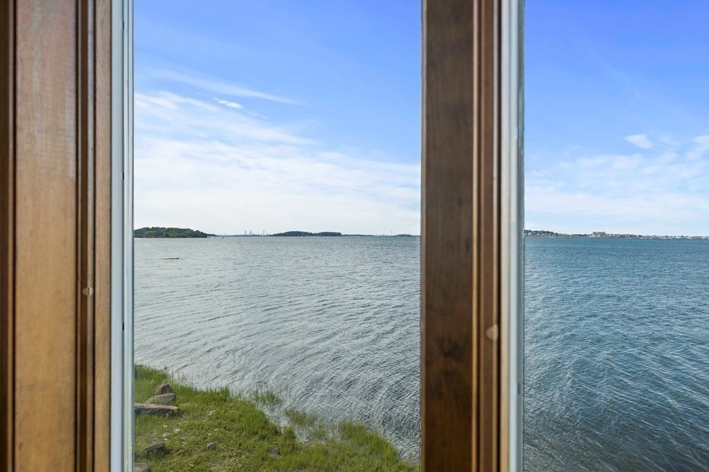 212 Nantasket Road Hull, MA 02045 - Photo 30 of 36 a view of a lake from a window