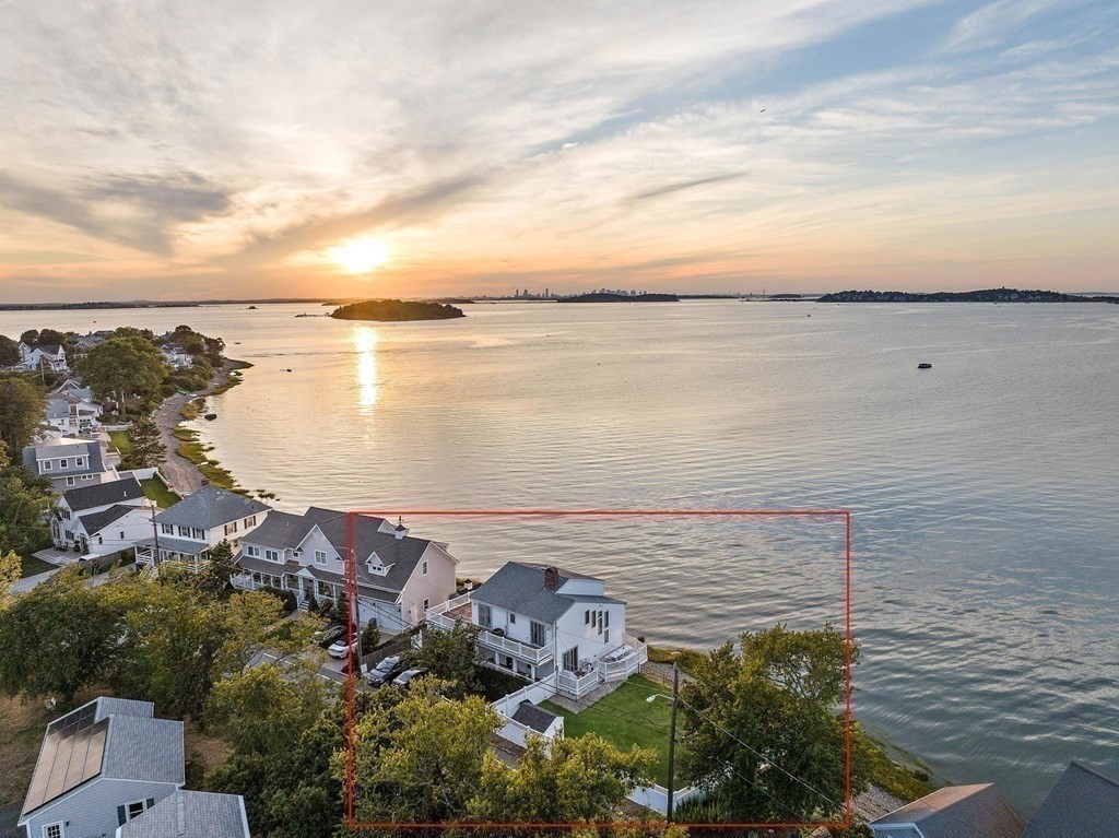 212 Nantasket Road Hull, MA 02045 - Photo 3 of 36 a view of a lake from a yard