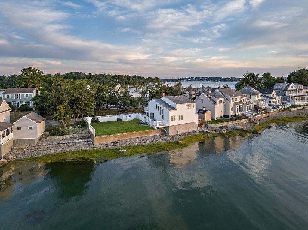 212 Nantasket Road Hull, MA 02045 - Photo 6 of 36 a view of a lake with roof