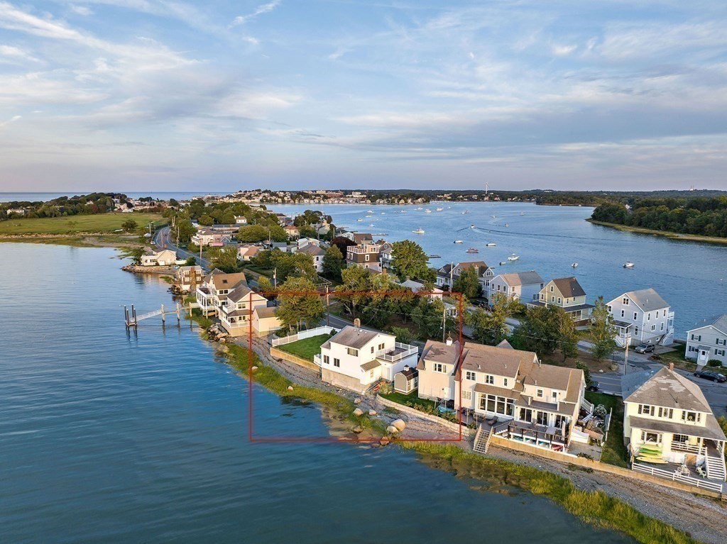 212 Nantasket Road Hull, MA 02045 - Photo 7 of 36 an aerial view of a house with a ocean view