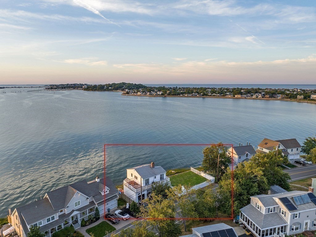 212 Nantasket Road Hull, MA 02045 - Photo 10 of 36 an aerial view of a house with a lake view