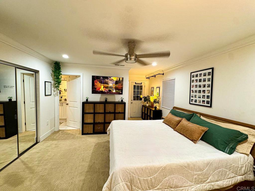 2687 Littleton Road El Cajon, CA 92020 - Photo 13 of 24 a bed room with a bed and a television