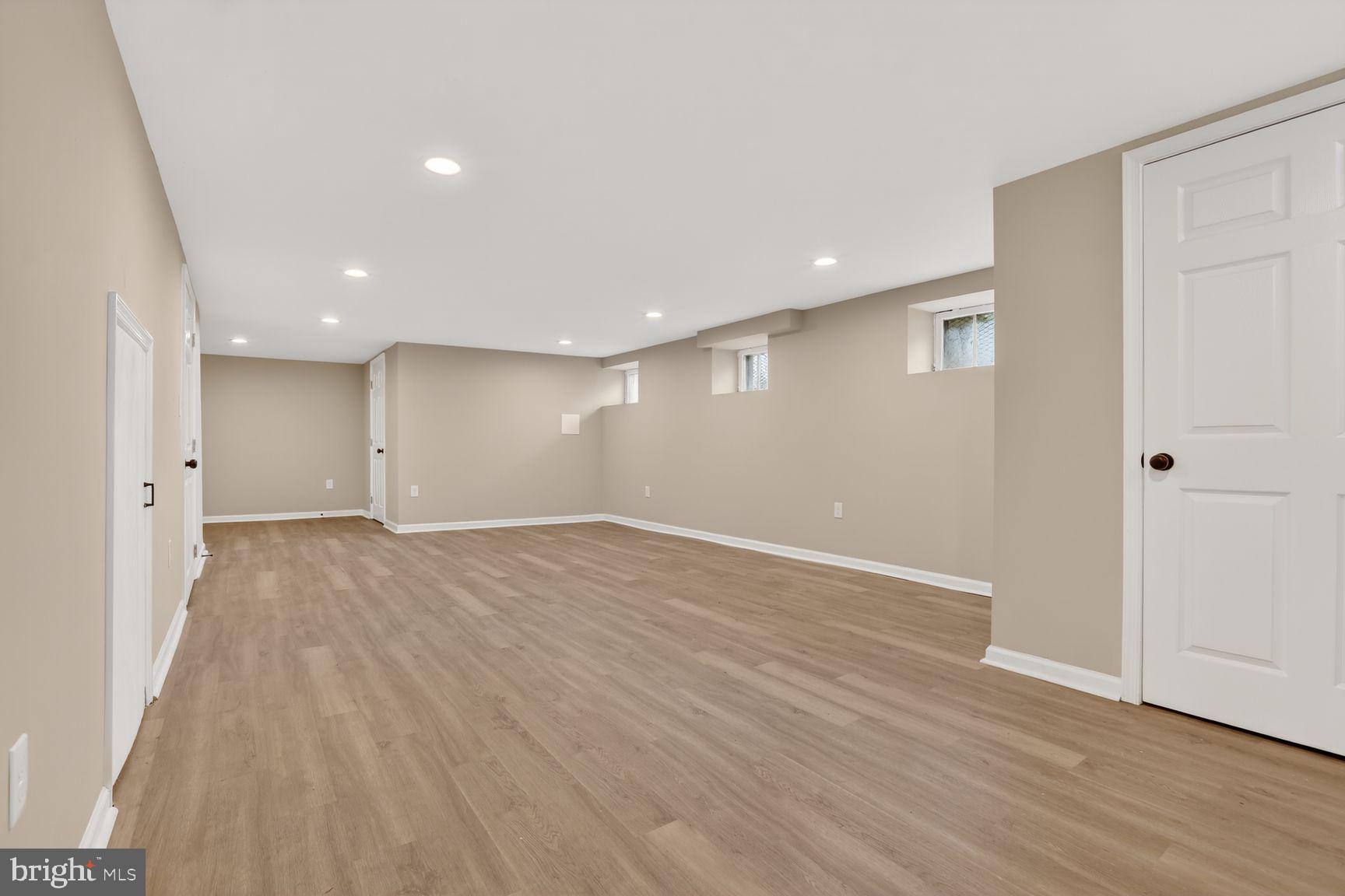 315 East Cold Spring Lane Baltimore, MD 21212 - Photo 8 of 25 a view of an empty room with wooden floor