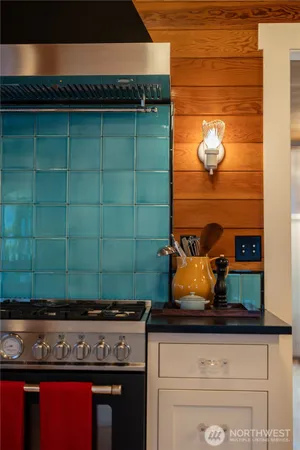 a bathroom with a sink and cabinets