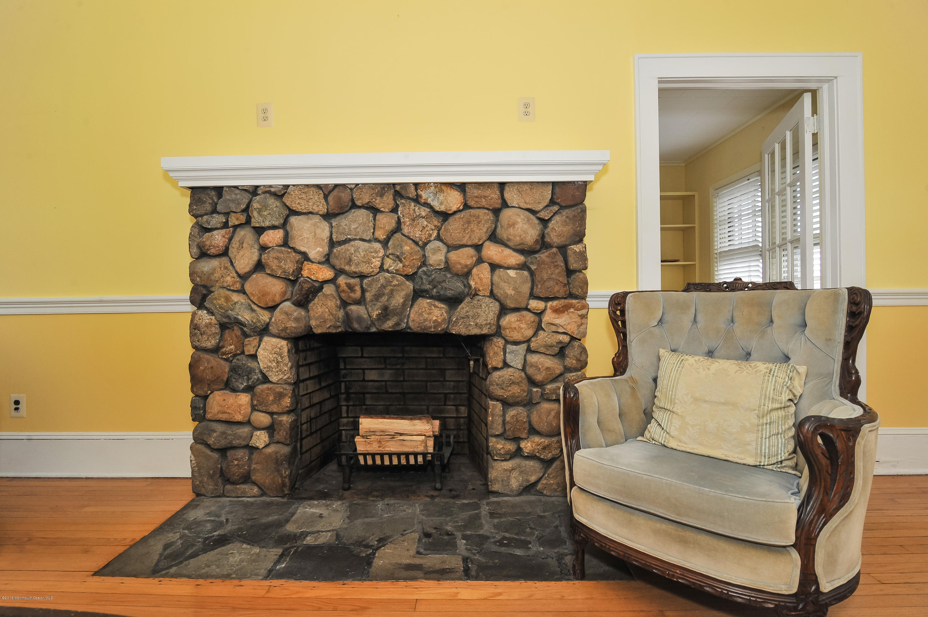 500 Adelphia Road Freehold, NJ 07728 - Photo 13 of 29 a living room with a couch and a fireplace