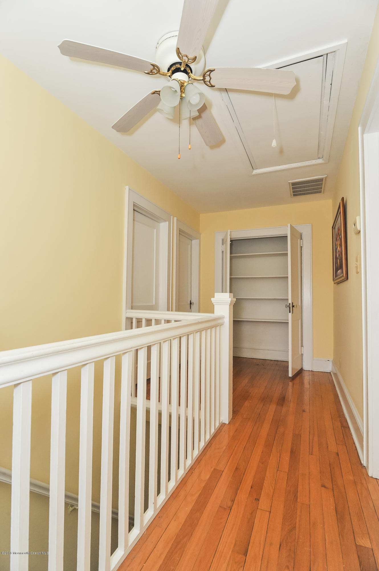 500 Adelphia Road Freehold, NJ 07728 - Photo 21 of 29 a view of a hallway with wooden floor