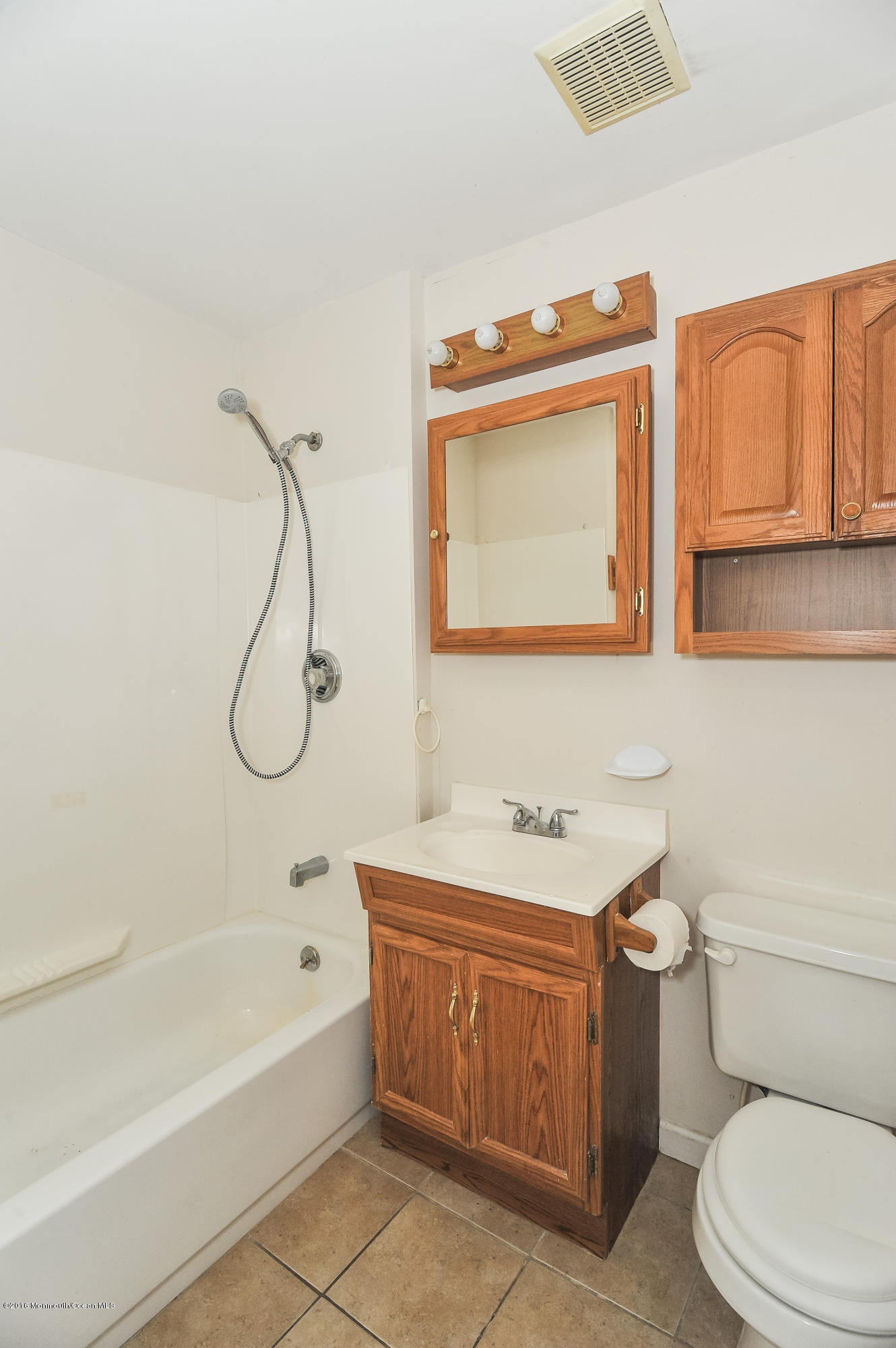 500 Adelphia Road Freehold, NJ 07728 - Photo 26 of 29 a bathroom with a sink a toilet and bathtub