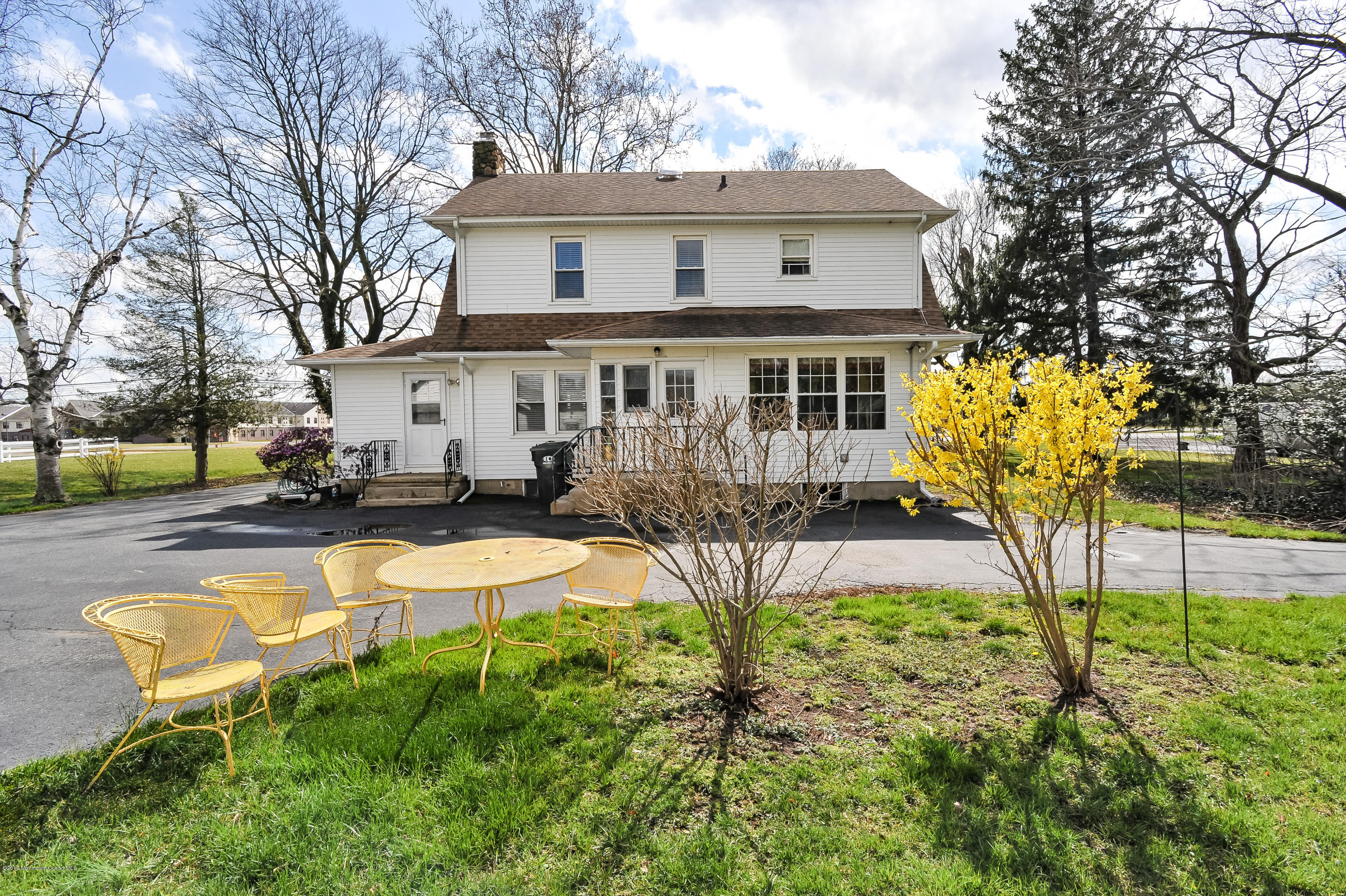 500 Adelphia Road Freehold, NJ 07728 - Photo 28 of 29 a view of a house with swimming pool and sitting area