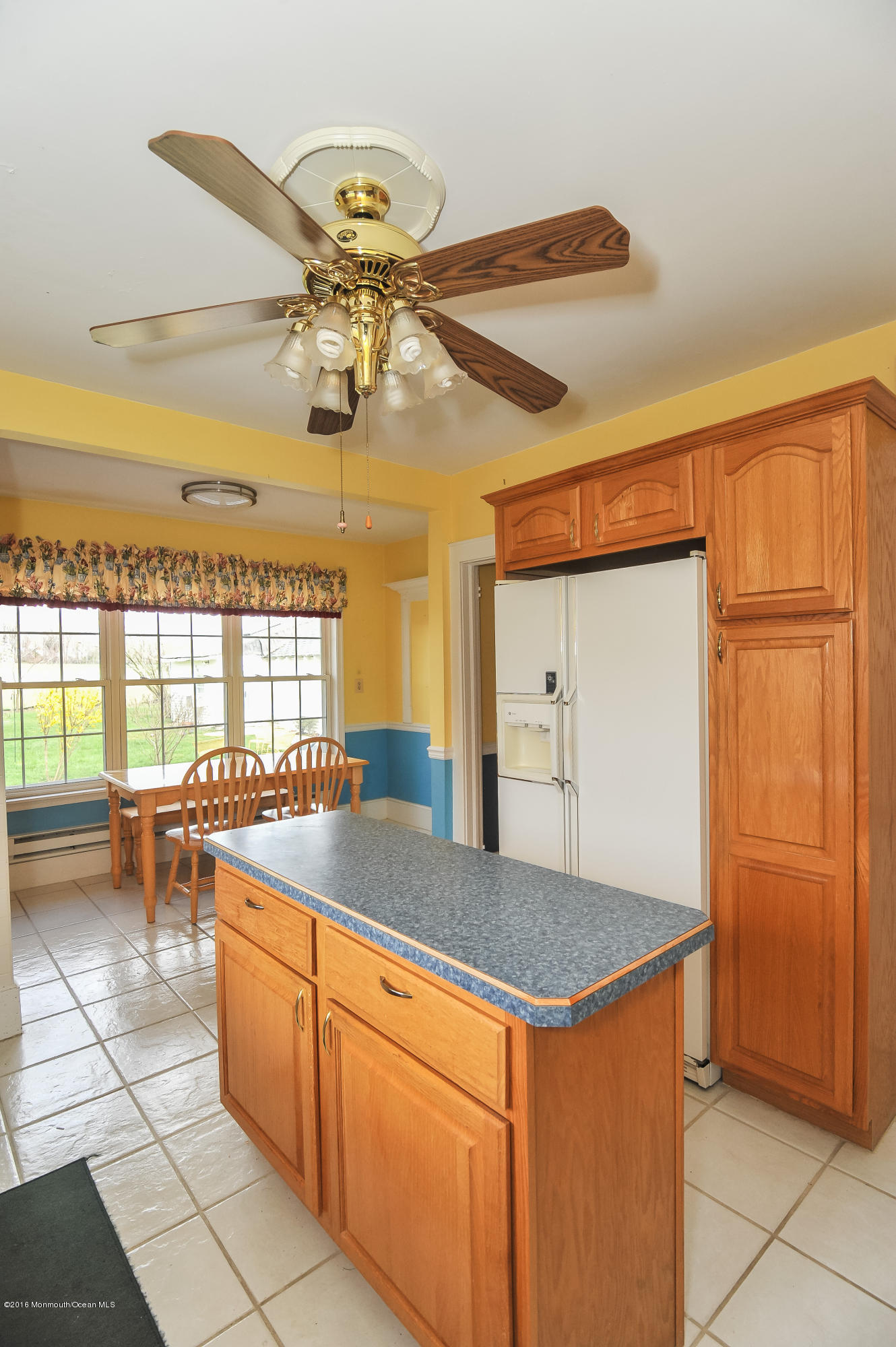 500 Adelphia Road Freehold, NJ 07728 - Photo 4 of 29 a kitchen with stainless steel appliances granite countertop a sink and a refrigerator