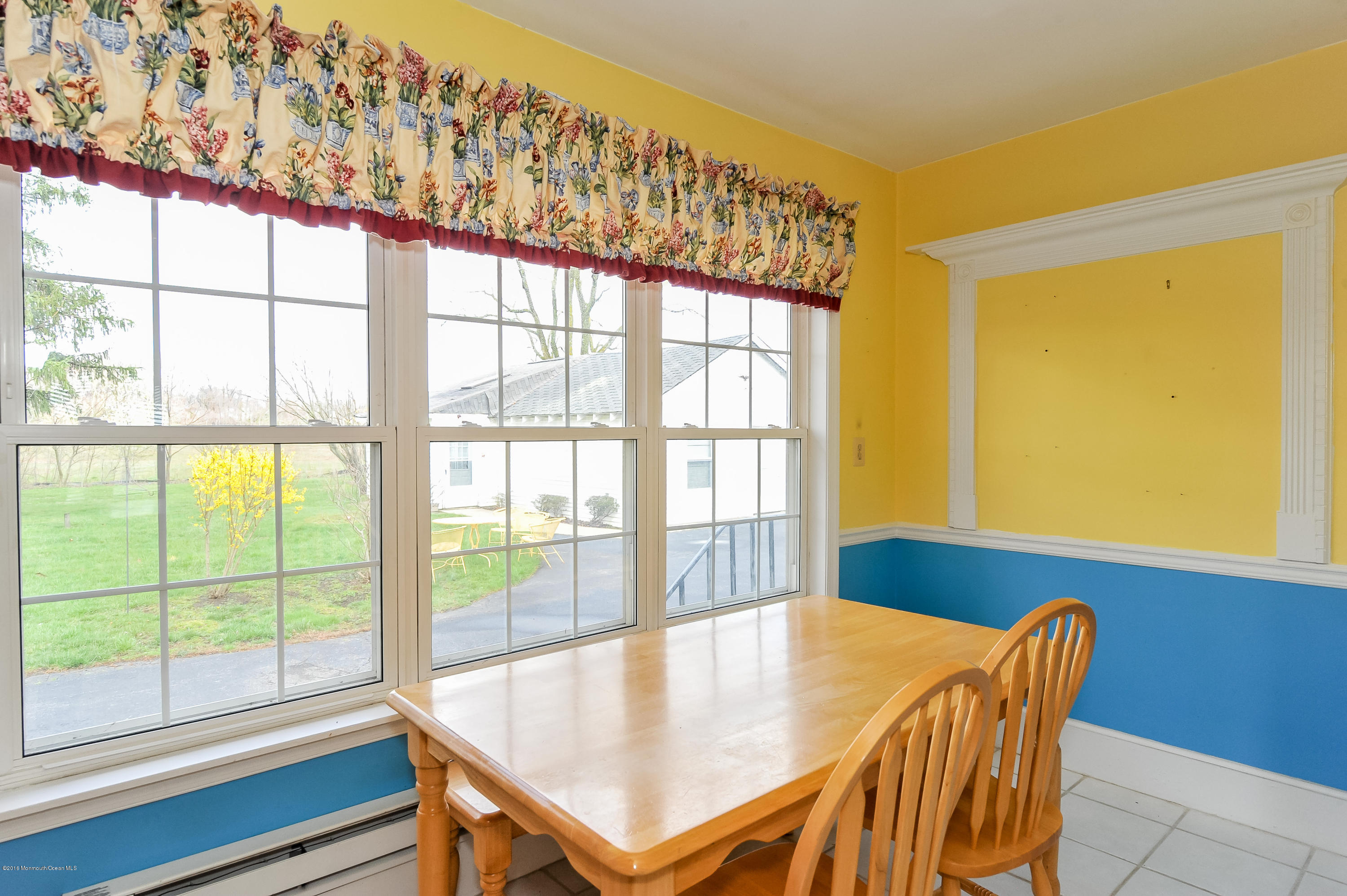 500 Adelphia Road Freehold, NJ 07728 - Photo 7 of 29 a dining room with a table and chairs