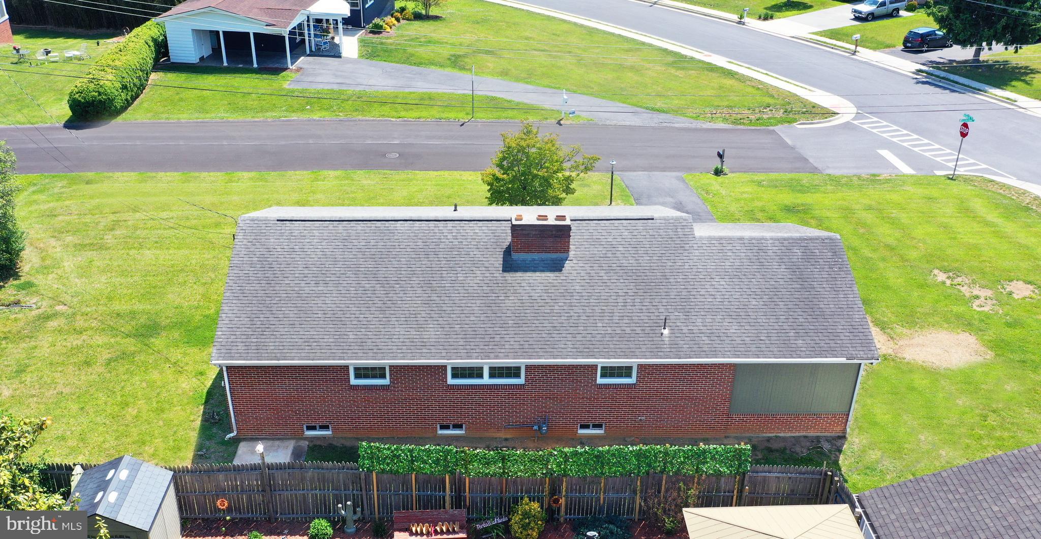437 Beechcroft Road Winchester, VA 22601 - Photo 4 of 52 an aerial view of a house with a swimming pool