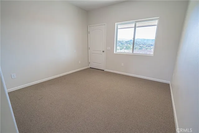 a bathroom with a shower a toilet and a sink