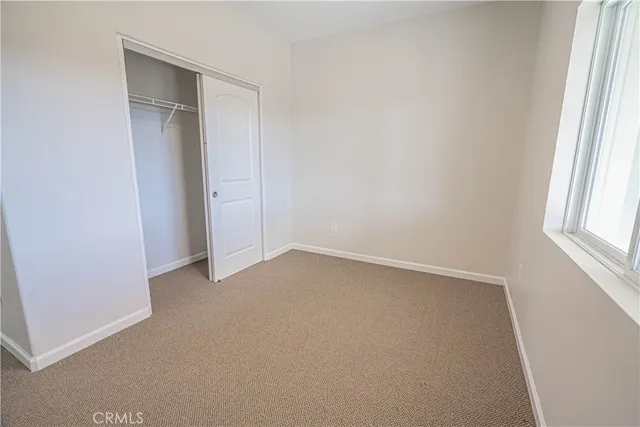 a view of sitting area with furniture and city view