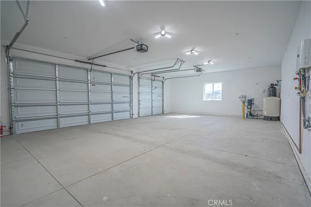 a view of a lush green hillside and houses
