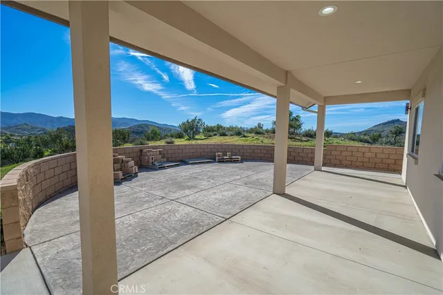 a view of a backyard of the house