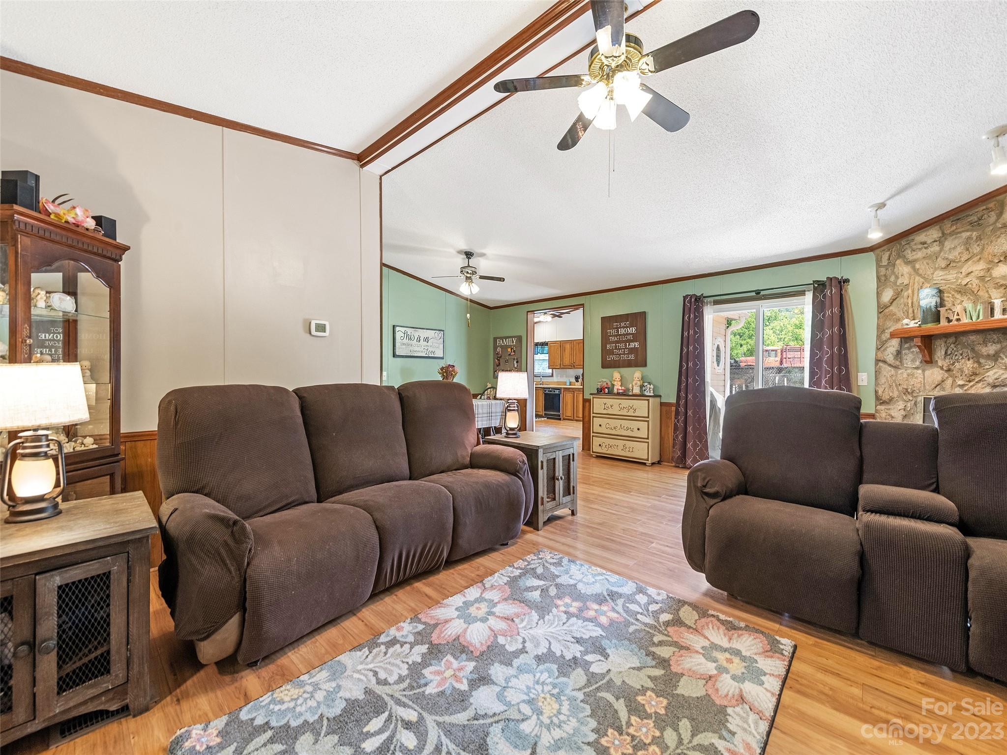 38 Happy Acres Road Waynesville, NC 28785 - Photo 13 of 28 a living room with furniture and a flat screen tv