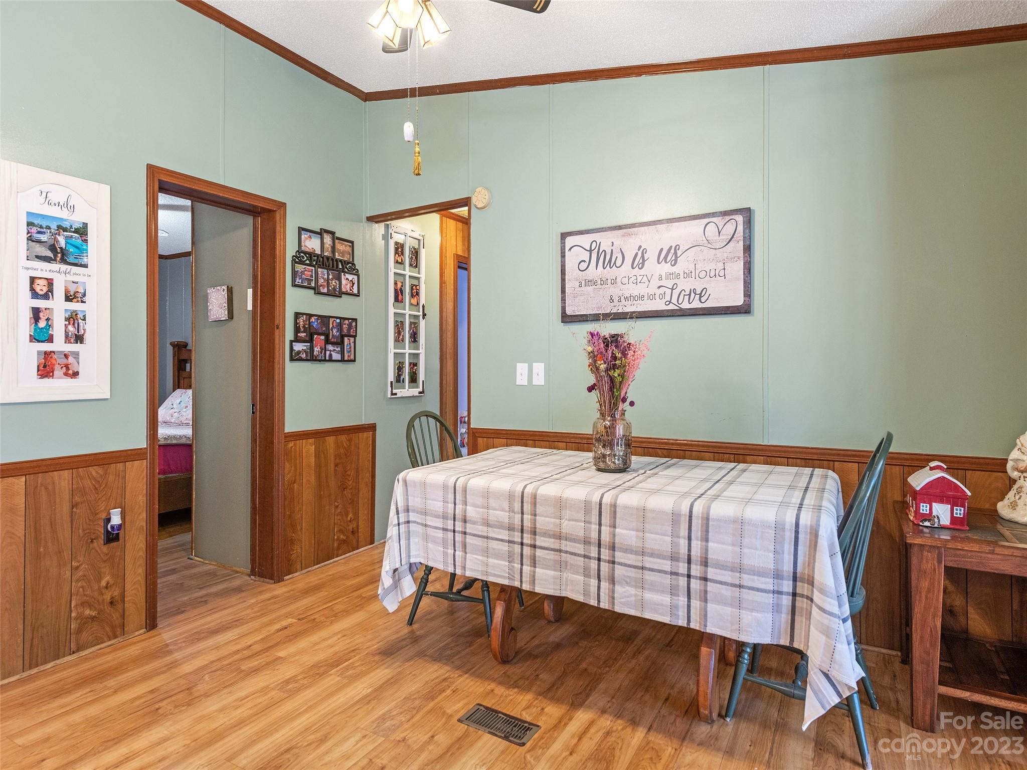 38 Happy Acres Road Waynesville, NC 28785 - Photo 19 of 28 a bedroom with a bed and a table in it