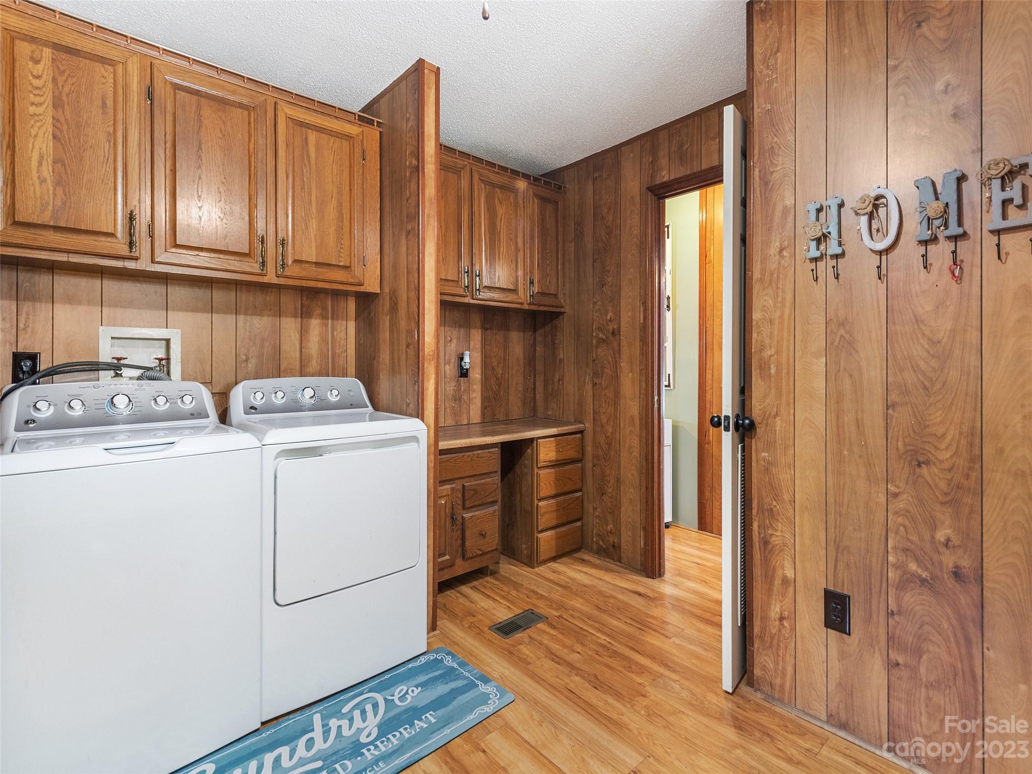 38 Happy Acres Road Waynesville, NC 28785 - Photo 28 of 28 a utility room with closet dryer and washer