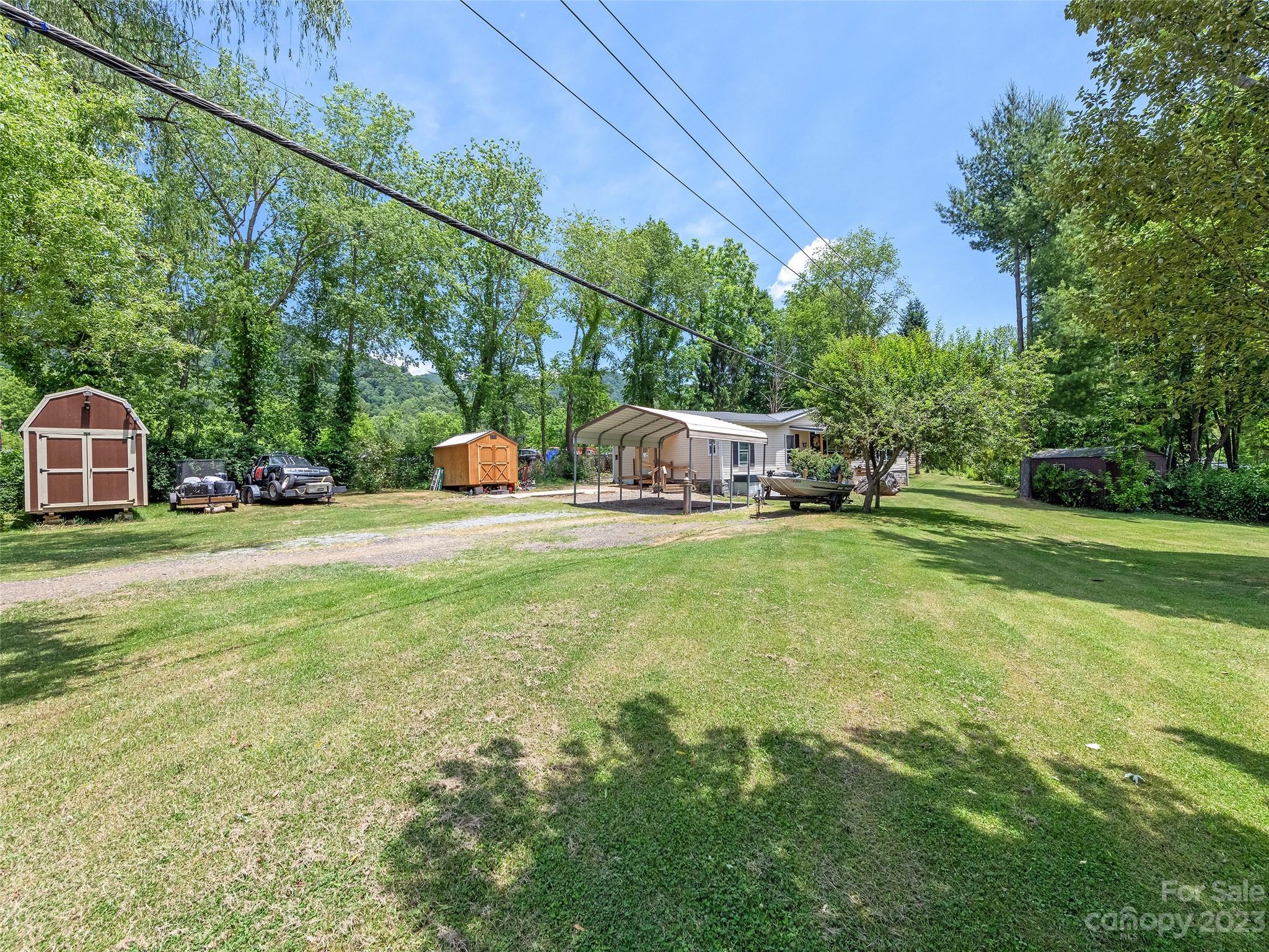 38 Happy Acres Road Waynesville, NC 28785 - Photo 4 of 28 a view of garden with trees in the background