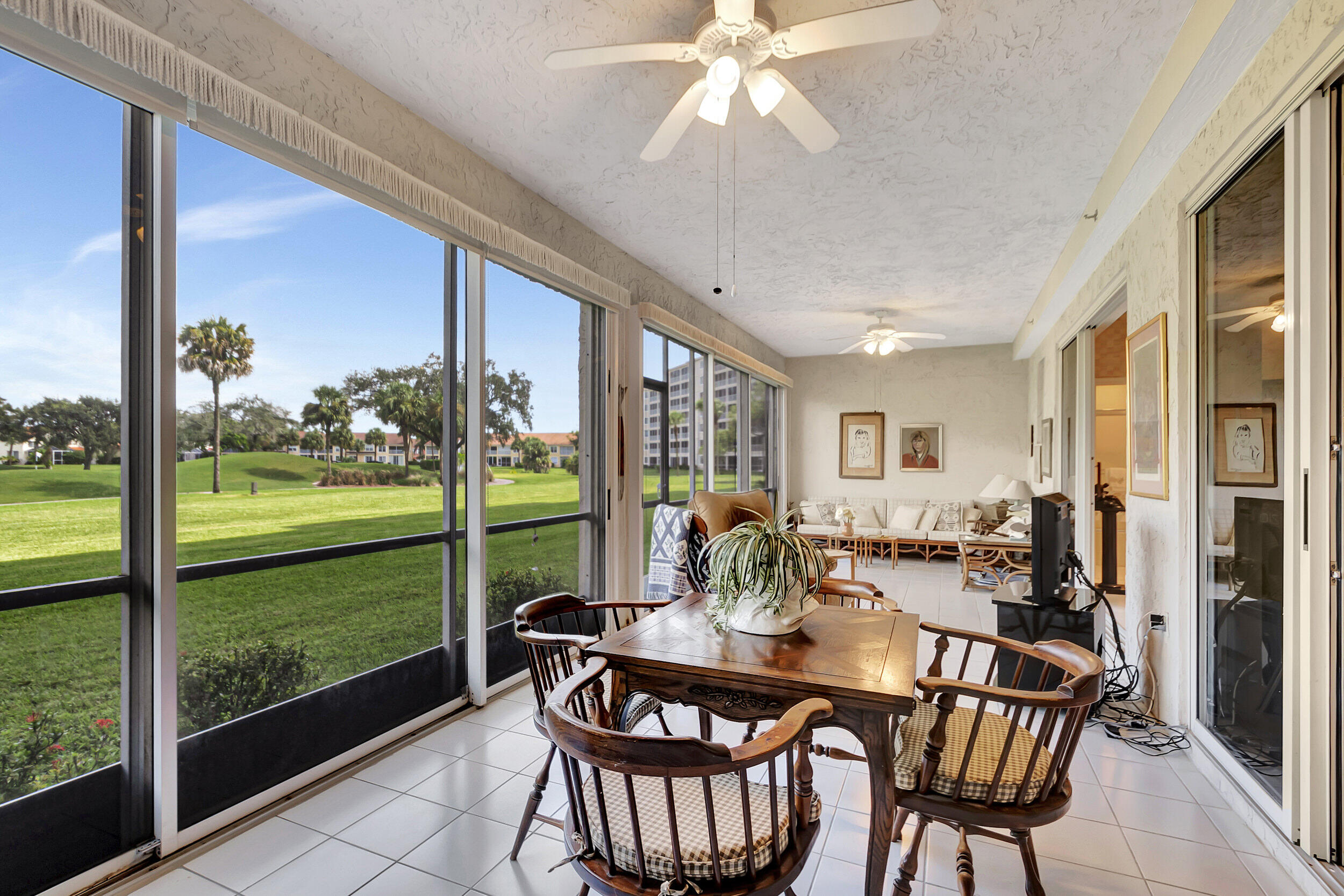 17031 Boca Club Boulevard, Unit 61B Boca Raton, FL 33487 - Photo 26 of 45 Enclosed (with screen) balcony/lanai