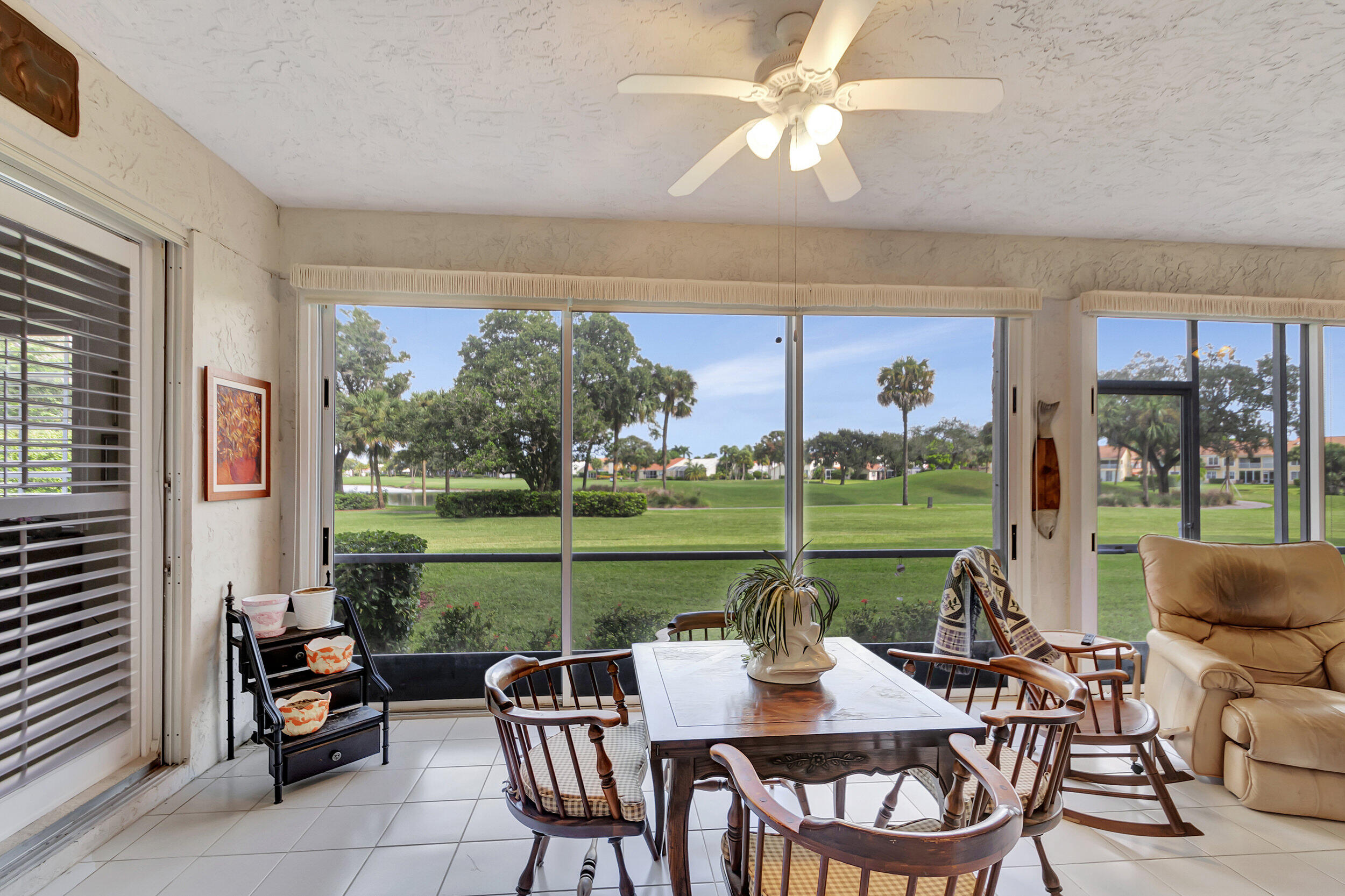 17031 Boca Club Boulevard, Unit 61B Boca Raton, FL 33487 - Photo 27 of 45 Enclosed balcony/lanai