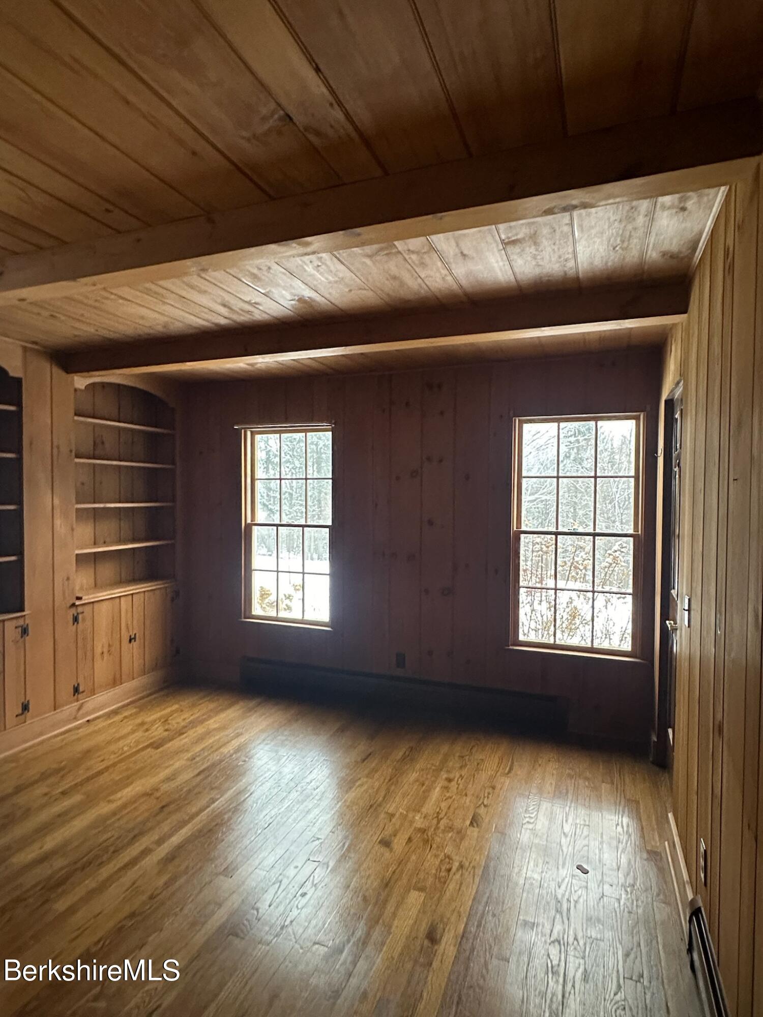 1172 Bluestone Road Bennington, VT 05201 - Photo 19 of 52 a view of empty room with wooden floor and fan