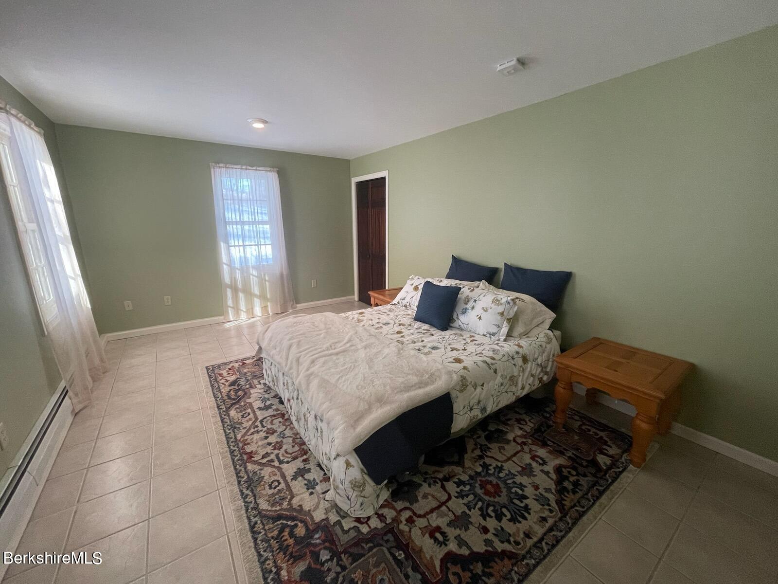 1172 Bluestone Road Bennington, VT 05201 - Photo 25 of 52 a bedroom with a bed and window