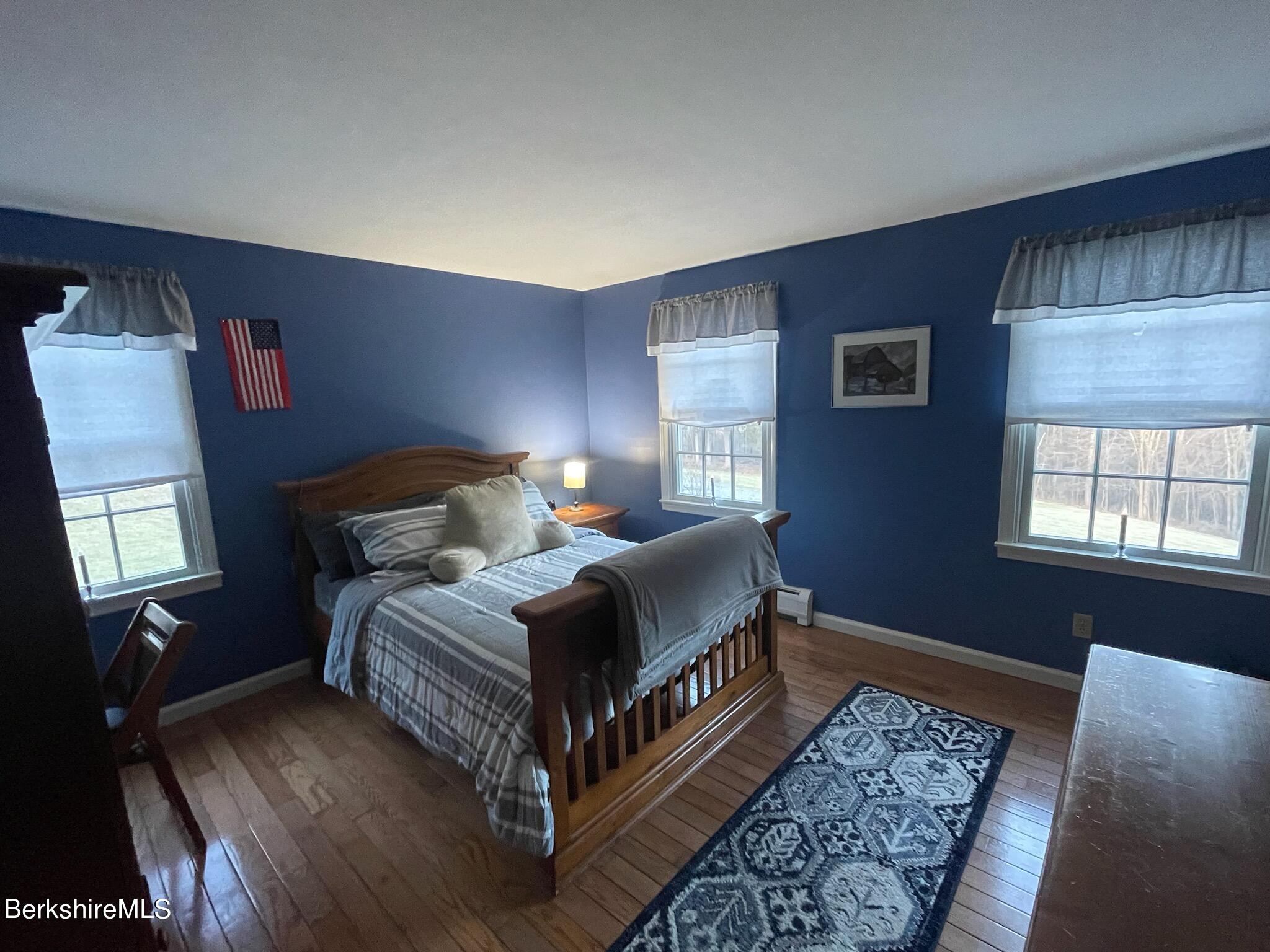 1172 Bluestone Road Bennington, VT 05201 - Photo 30 of 52 a bedroom with bed and window