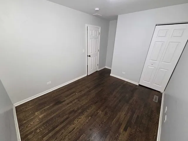 a view of small space with wooden floor