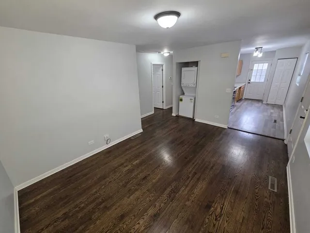 a view of a livingroom with wooden floor
