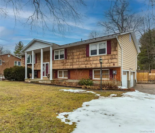 a view of a house with a street