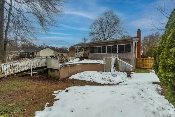 a view of a patio with a yard