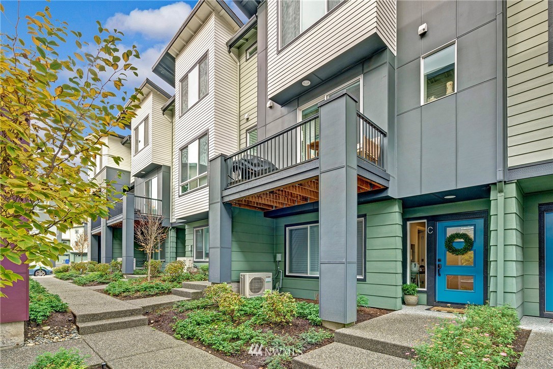 606 237th Street Southeast, Unit C Bothell, WA 98021 - Photo 1 of 27 a view of a building with brick walls