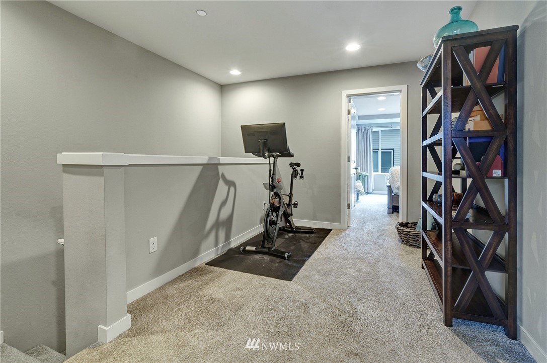 606 237th Street Southeast, Unit C Bothell, WA 98021 - Photo 14 of 27 a view of a room with gym equipment