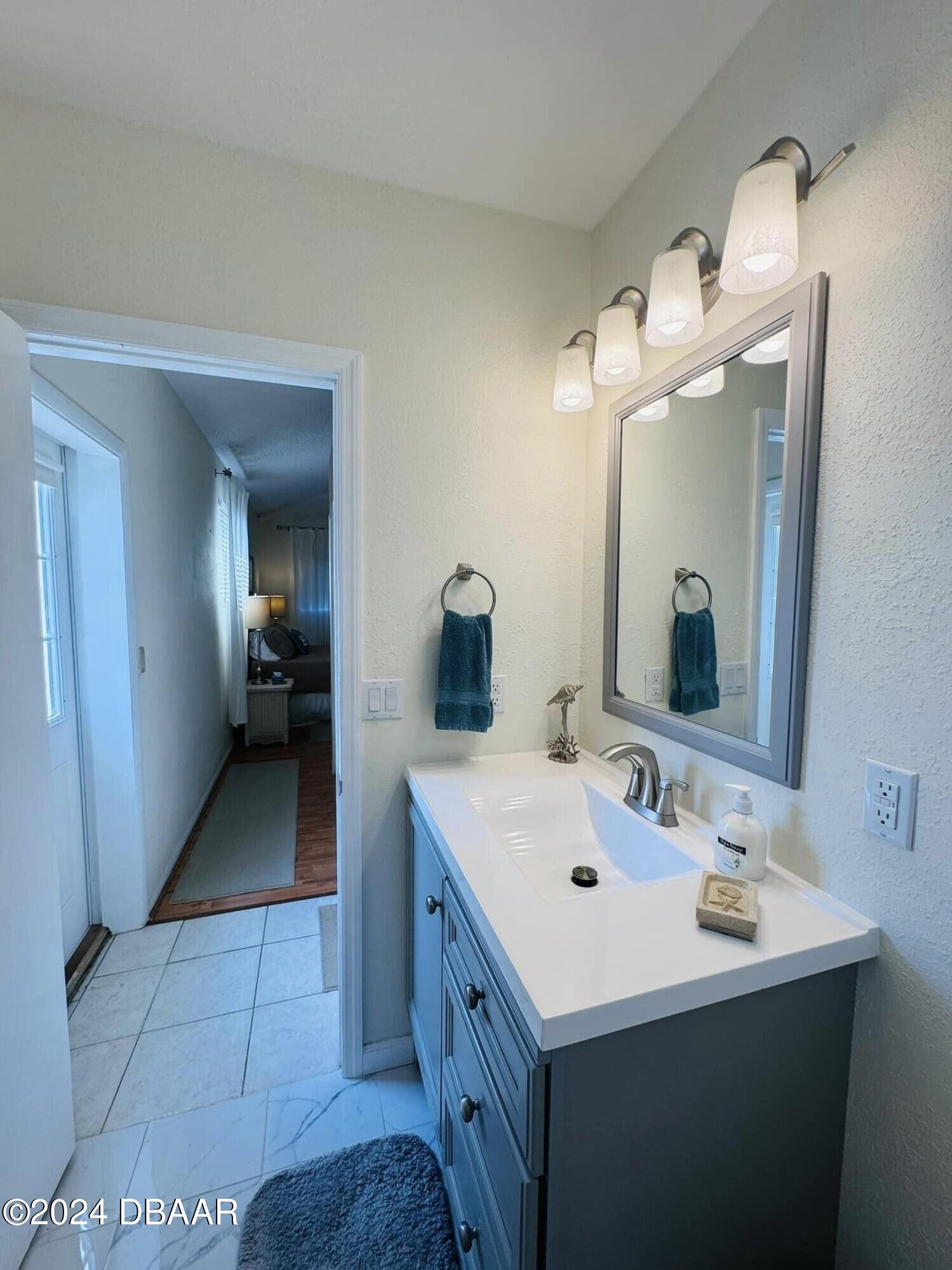 12 Berkley Road Ormond Beach, FL 32176 - Photo 18 of 44 primary bath