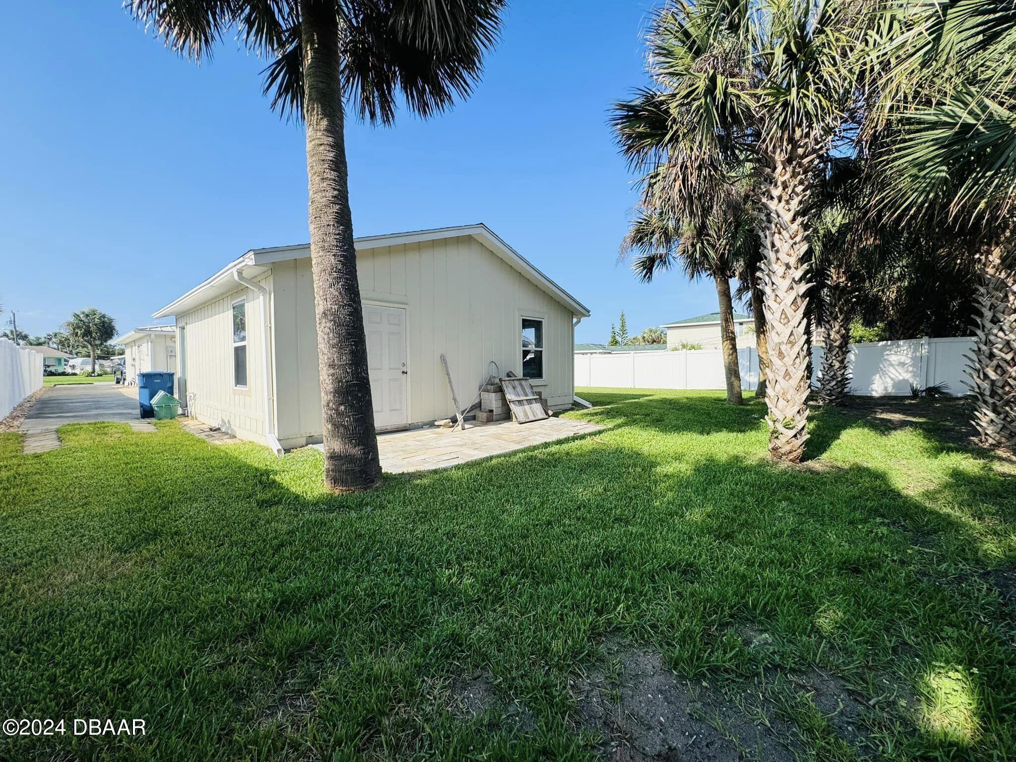 12 Berkley Road Ormond Beach, FL 32176 - Photo 34 of 44 yard behind garage