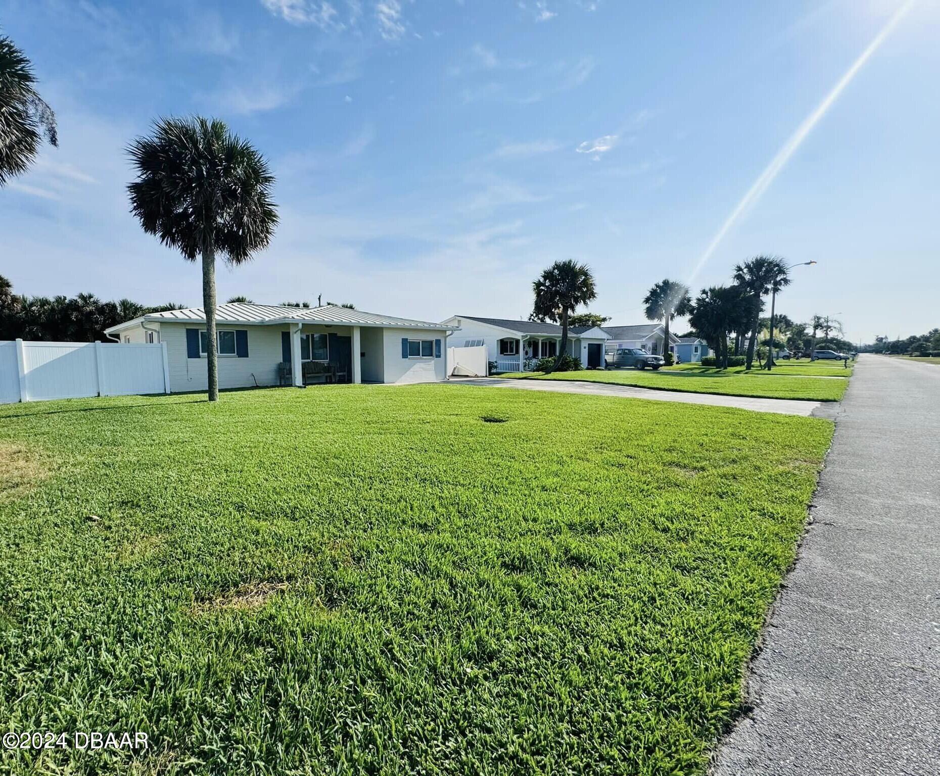 12 Berkley Road Ormond Beach, FL 32176 - Photo 43 of 44 lush lawn