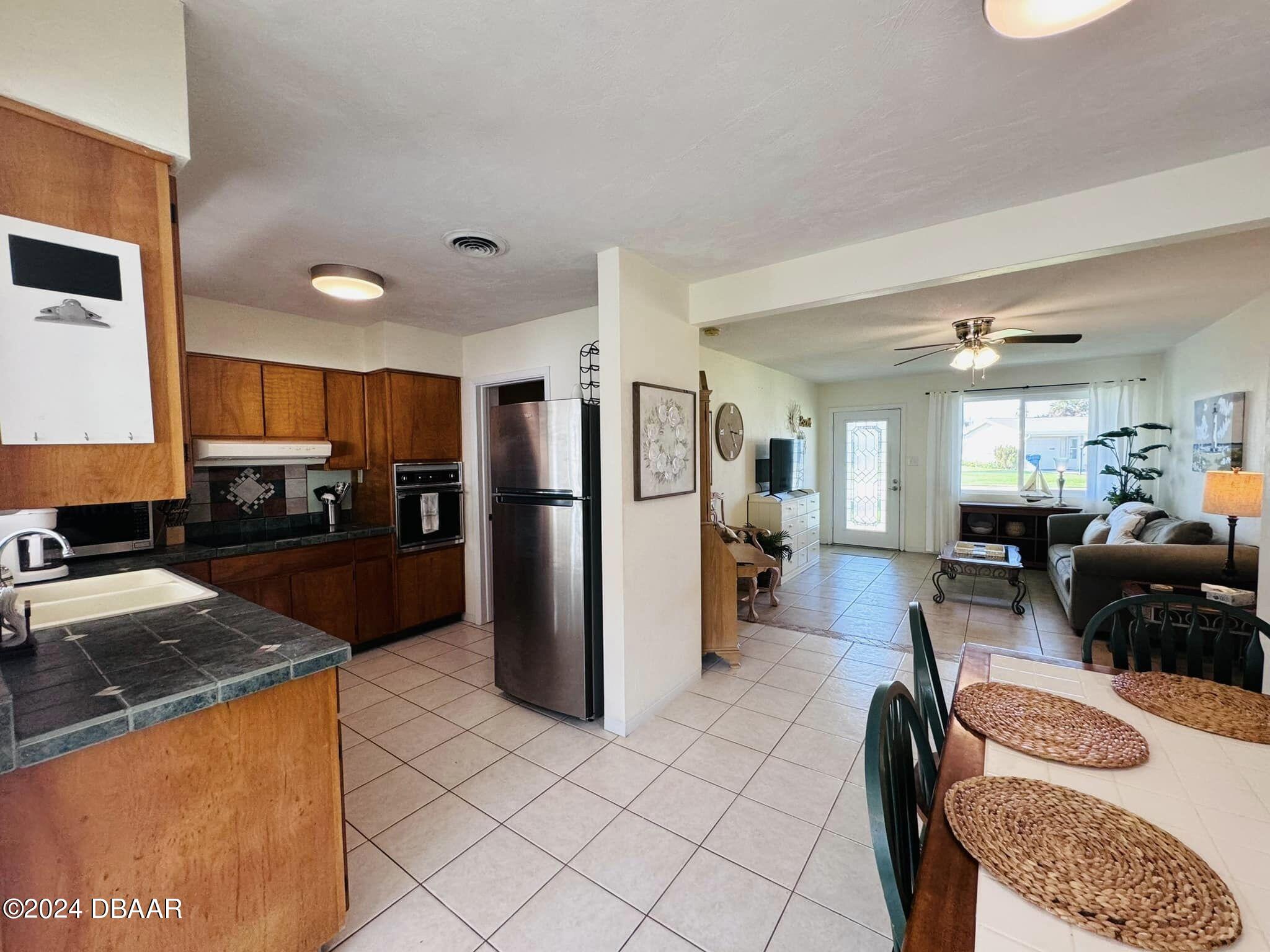 12 Berkley Road Ormond Beach, FL 32176 - Photo 8 of 44 dining kitchen