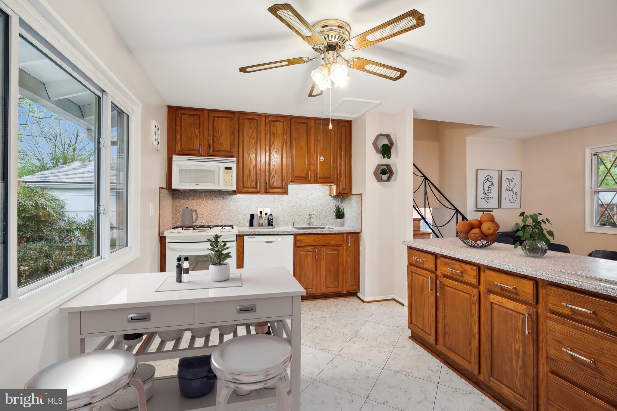 4105 Tulare Drive Silver Spring, MD 20906 - Photo 1 of 54 a kitchen with stainless steel appliances granite countertop a sink a stove and a refrigerator