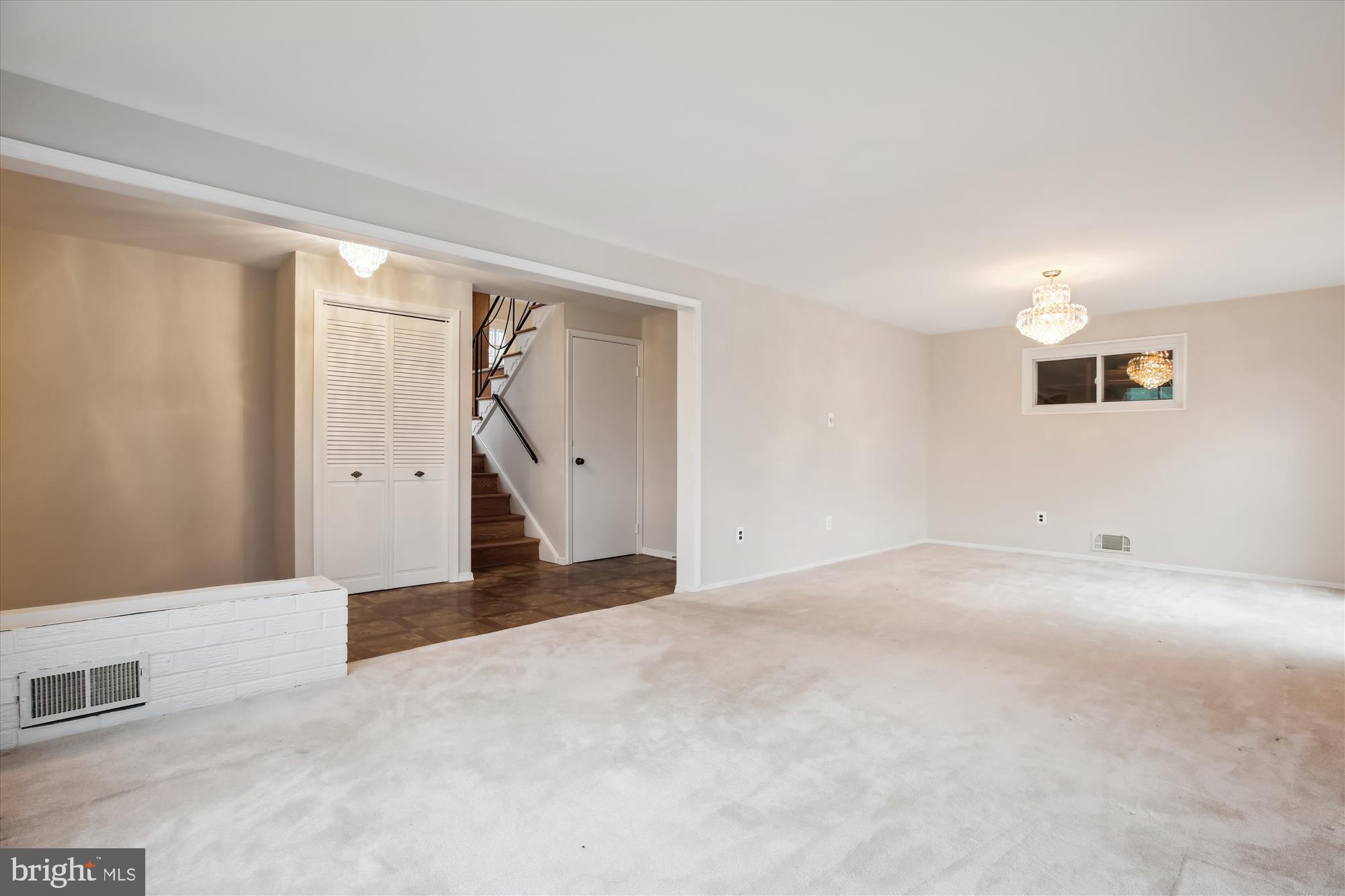 4105 Tulare Drive Silver Spring, MD 20906 - Photo 14 of 54 a view of an empty room with wooden floor and a window