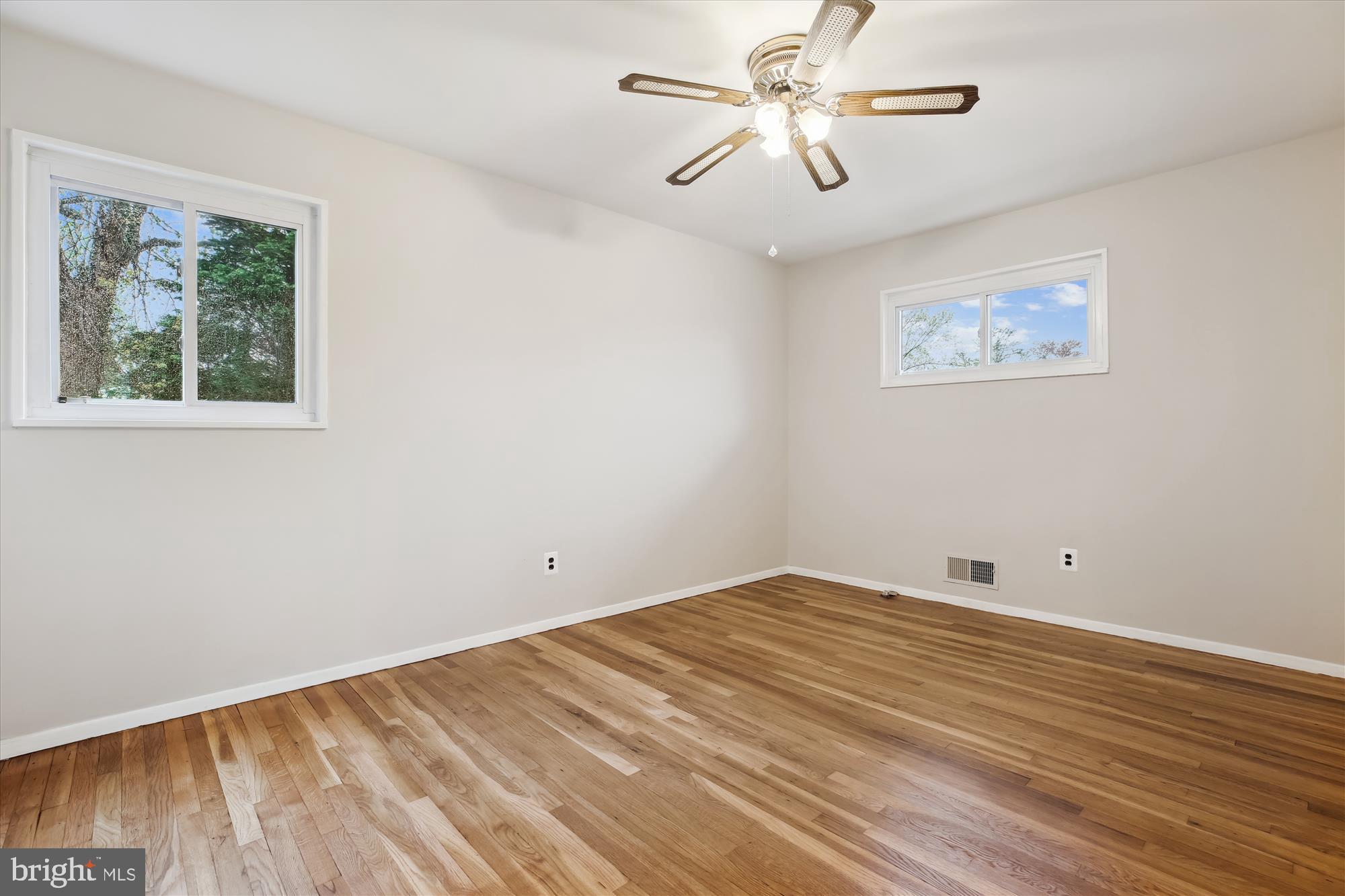 4105 Tulare Drive Silver Spring, MD 20906 - Photo 17 of 54 a view of empty room with wooden floor