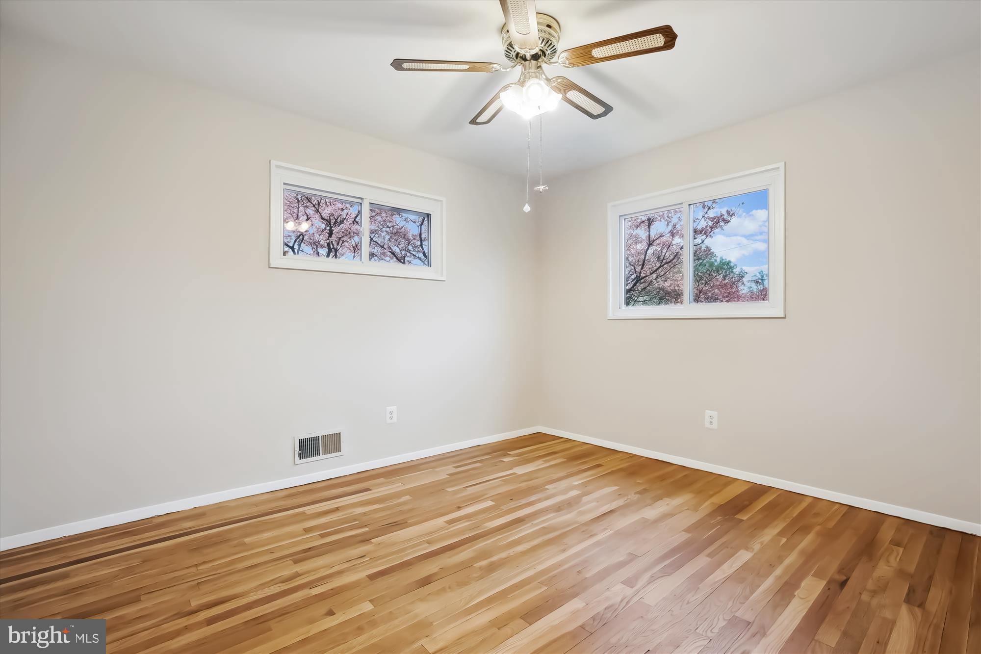 4105 Tulare Drive Silver Spring, MD 20906 - Photo 19 of 54 a view of an empty room with wooden floor