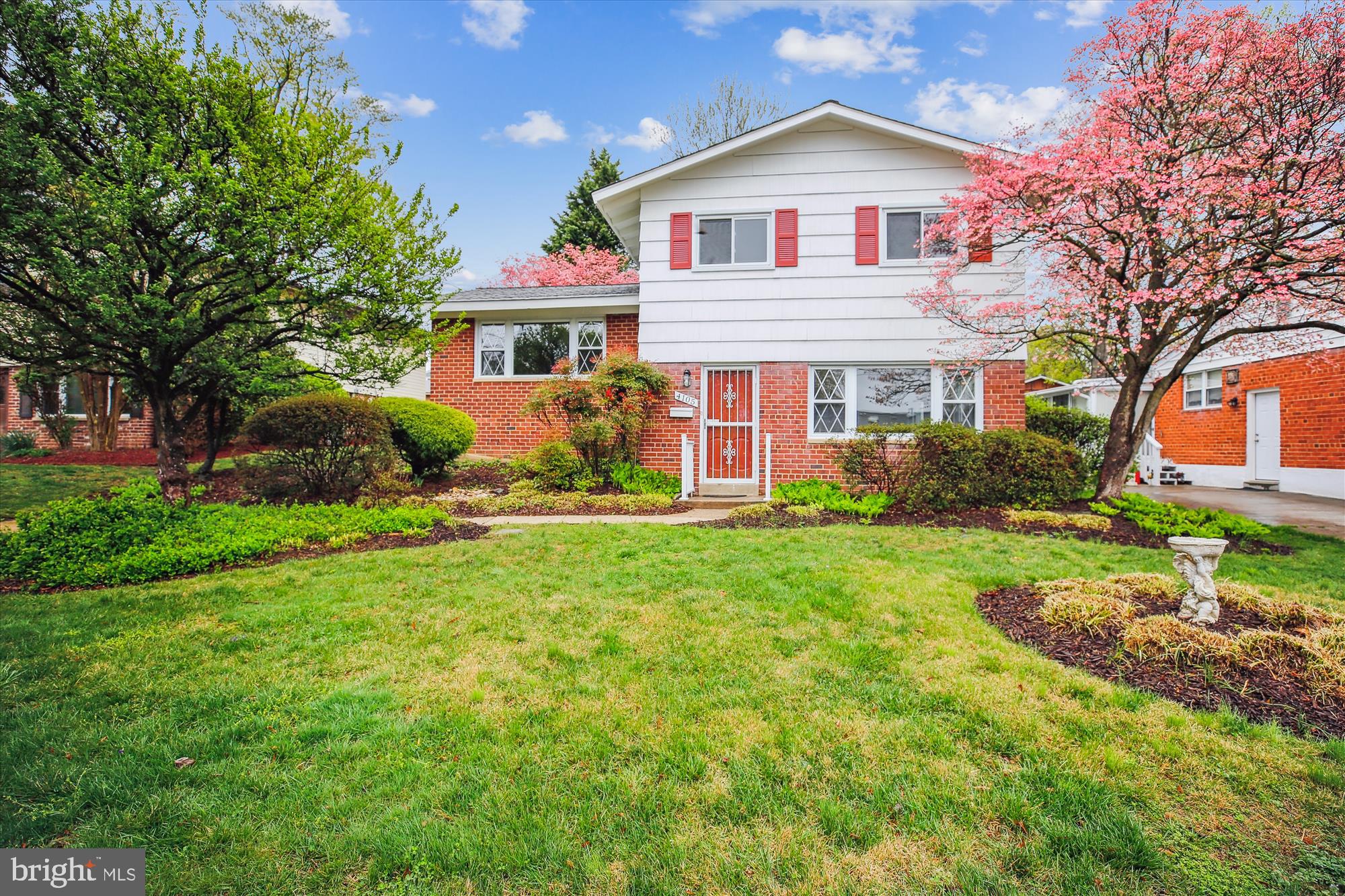 4105 Tulare Drive Silver Spring, MD 20906 - Photo 2 of 54 a front view of a house with garden
