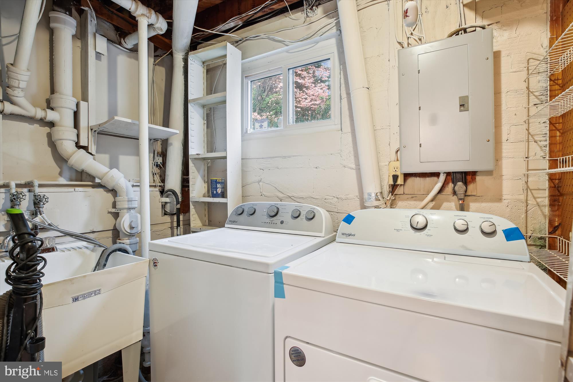 4105 Tulare Drive Silver Spring, MD 20906 - Photo 32 of 54 a utility room with dryer and washer