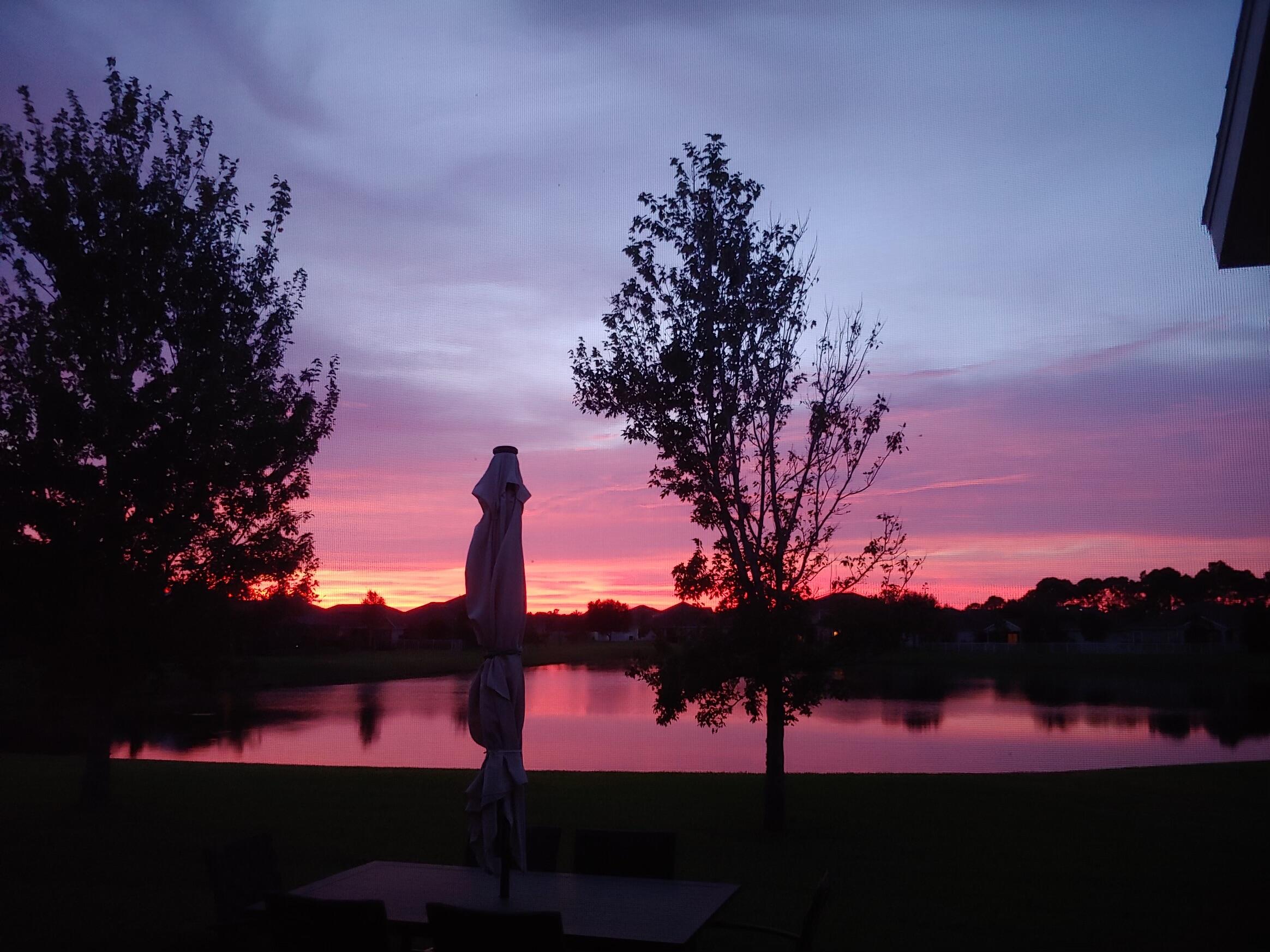 337 Abernathy Circle Palm Bay, FL 32909 - Photo 15 of 51 a view of sunset view with a lake