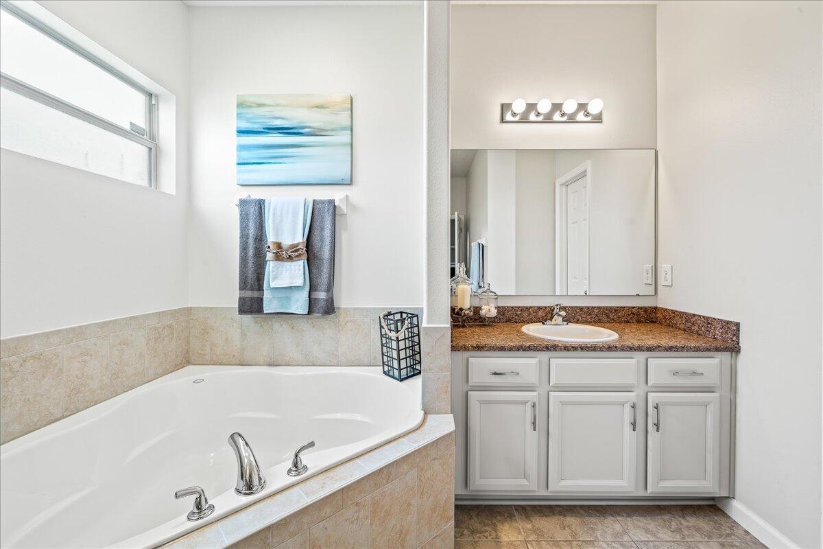 337 Abernathy Circle Palm Bay, FL 32909 - Photo 29 of 51 a bathroom with a bathtub and a sink